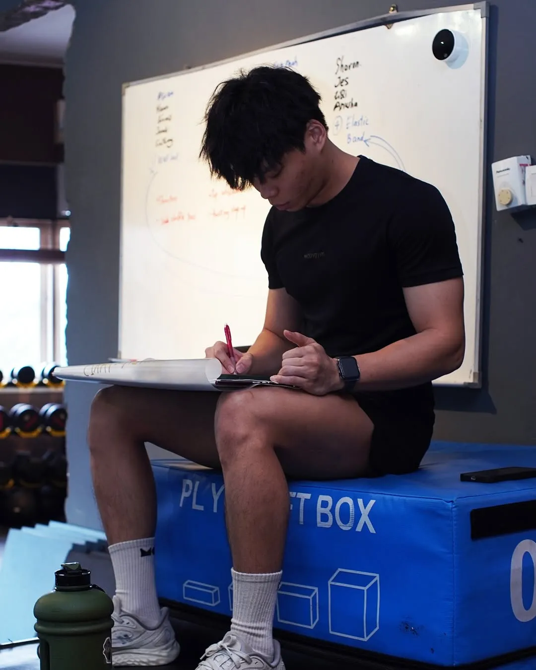 Walter planning a training session at Moov Gym